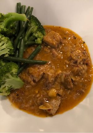A picture of Mackerel Thai Red Curry.