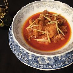 A picture of Chicken qorma.