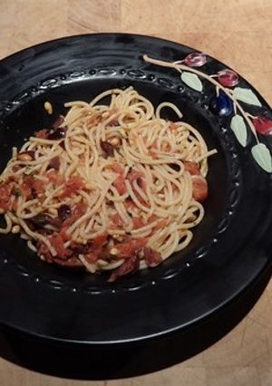 A picture of Pasta with Tomatoes, Kalamata Olives, and Goat Cheese.