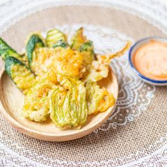 A picture of Homegrown Courgette Tempura with sriracha mayo 🥒.