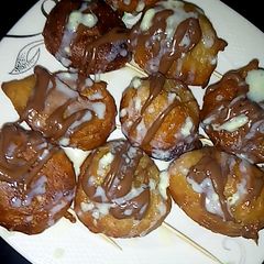 A picture of Puff puff wit choclate nd condenesed milk.
