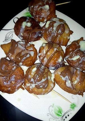 A picture of Puff puff wit choclate nd condenesed milk.