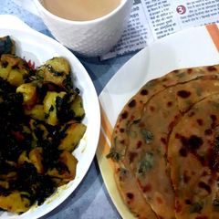 Aloo methi with methi laccha paratha A picture of Aloo methi with methi laccha paratha.
