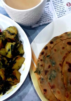 A picture of Aloo methi with methi laccha paratha.