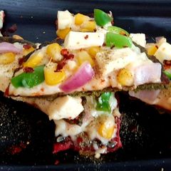 A picture of Beetroot Spinach Bhakhri Pizza Sticks.