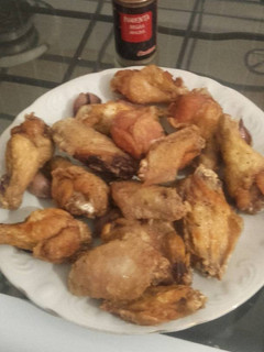 Una foto de Alitas de pollo a la pimienta
