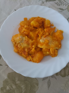 Una foto de Papas guisadas con huevo cuajado