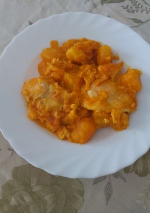 Una foto de Papas guisadas con huevo cuajado