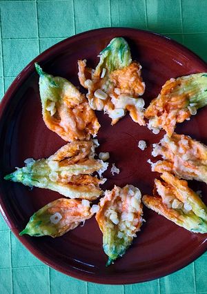 Una foto de Flores de calabacín al ajillo