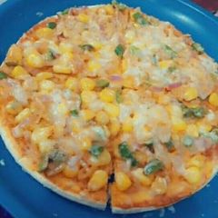 A picture of Corn pizza.