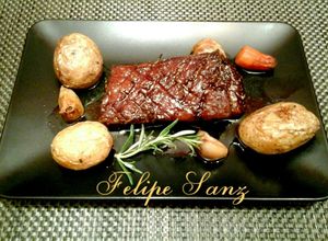 Una foto de Falda de ternera al horno con patatas asadas