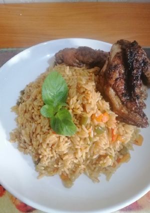A picture of Fried Rice with Grilled chicken.