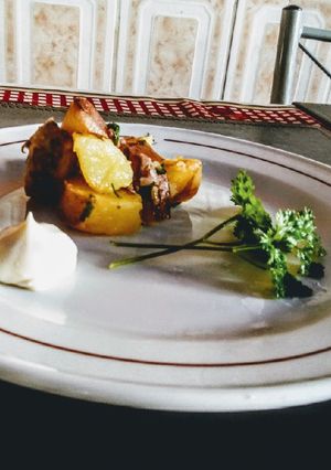 Una foto de Papas al perejil