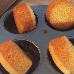 A picture of Cornbread with kimchi and cheddar.