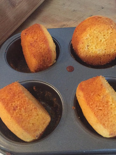A picture of Cornbread with kimchi and cheddar.