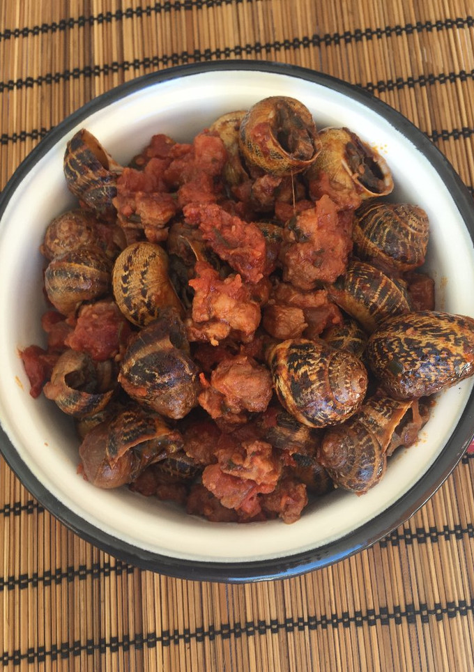Una foto de Caracoles en salsa