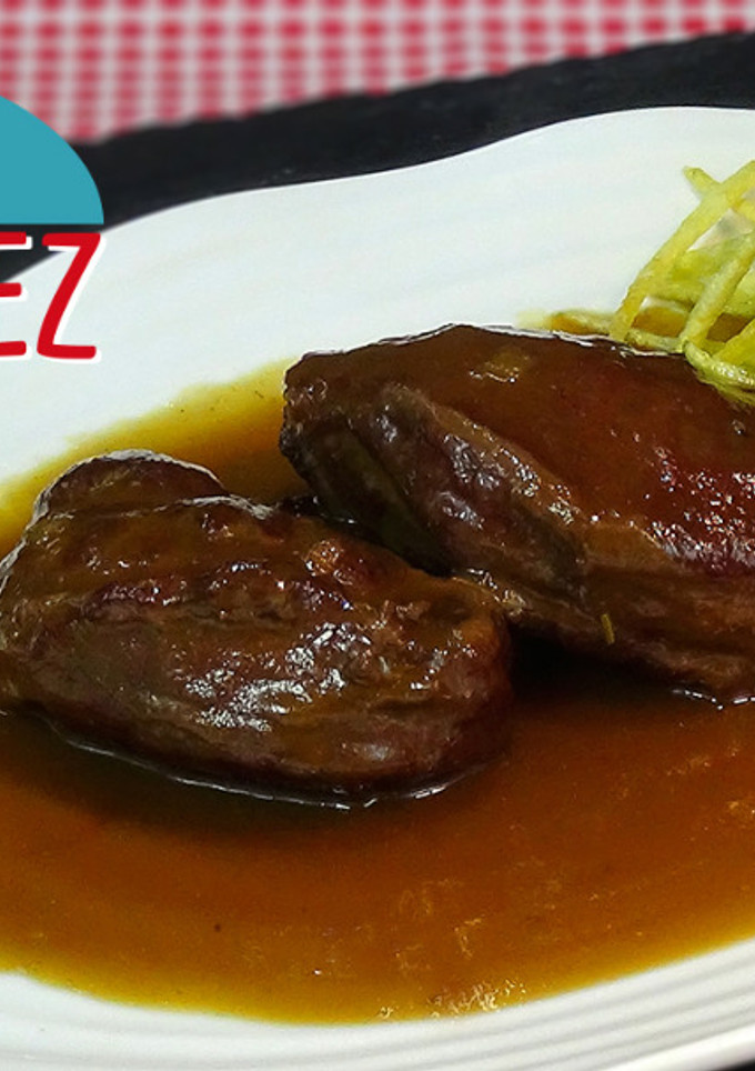 Una foto de Carrilleras de cerdo en salsa PX y patatas paja