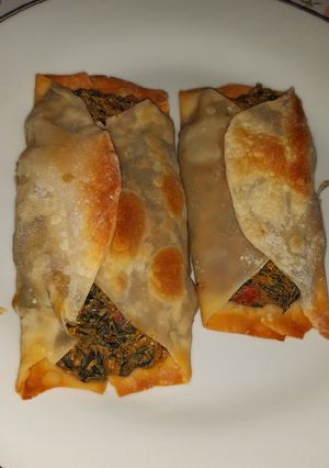 Una foto de Burritos de espinaca y ricotta