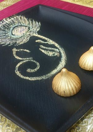 A picture of Golden Glory Dry Fruit Chocolate modak.