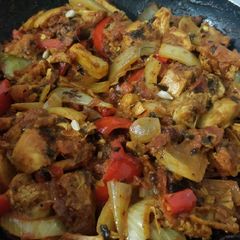 A picture of Leftover grilled chicken karahi/kharahi (stir fried curry).