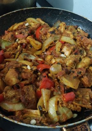 A picture of Leftover grilled chicken karahi/kharahi (stir fried curry).