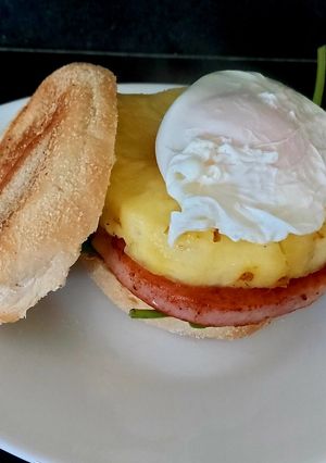 A picture of My Muffin with Gammon, Pineapple + Poached Egg on Spinach.