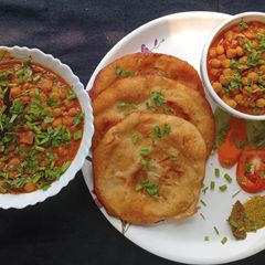 A picture of Butter Naan Paratha & Chole Matar.
