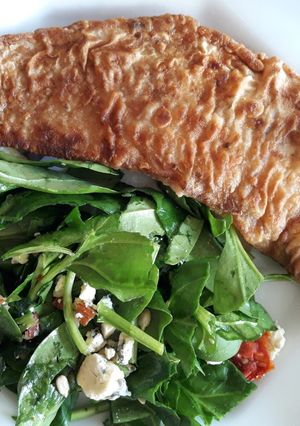 Una foto de Milanesa de merluza