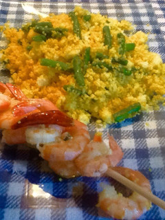 Una foto de Cous Cous con trigueros y gambas picantes