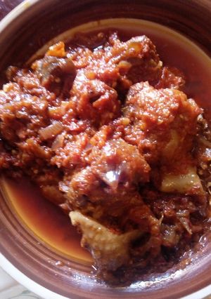 A picture of Gizzard sauce with Basmati rice.