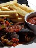 Fried yam with peppered snail