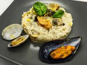 Una foto di risotto alici