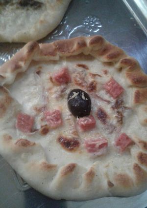 صورة لوصفة بيتزا على طريقة الشاف هشام