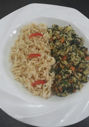 A picture of Pasta with fried egg.