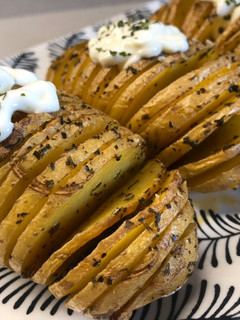 Una foto de Papas abanico con aceite especiado