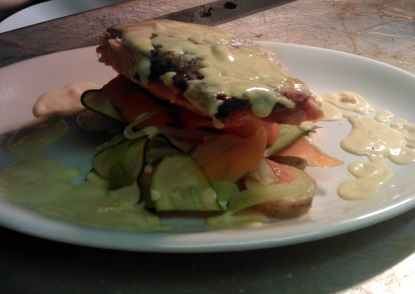grilled salmon with ribbons of medterainian vegtables with new potatoes and lemon butter sauce