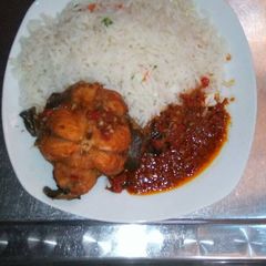 A picture of White rice and fish sauce.