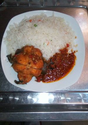 A picture of White rice and fish sauce.