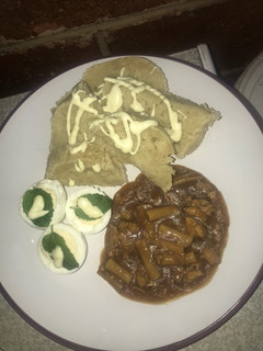 A picture of Dumpling served with pastarized chicken stew and minty eggs.