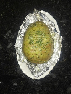 Una foto de Patatas al ajo y perejil