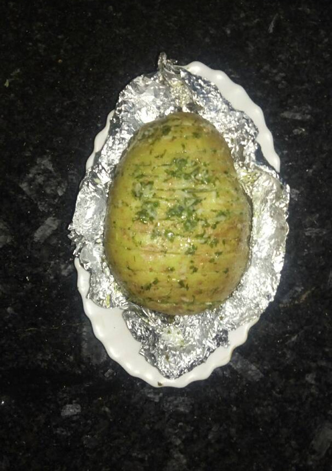 Una foto de Patatas al ajo y perejil