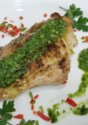 Una foto de Filete de pescado al ajillo con perejil