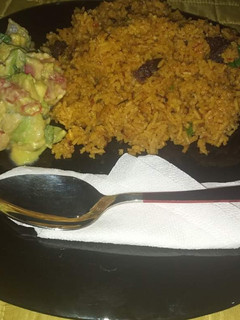 A picture of Pilau with guacamole.