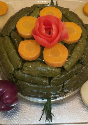 A picture of Stuffed Grape Leaves with Vegetables (also known as Yabraq, Yalanji, or Dolma, names vary by country).
