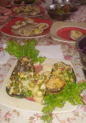 Una foto de Choro malton al pickle con palmitos, champiñones y sésamo