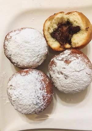 O poză a rețetei Gogoși pufoase cu cremă de ciocolată.