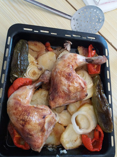 Una foto de Muslos de pollo al horno