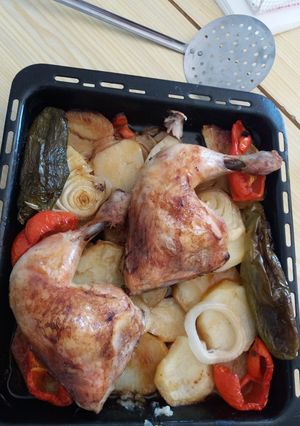 Una foto de Muslos de pollo al horno