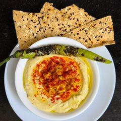 A picture of Sweet Corn 🌽 Hummus With Jowar Pitta.