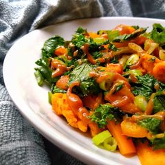 A picture of Sweet Potato & Kale Stir Fry With A Peanut Sesame Dressing.